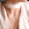 CIONDOLO CON ZIRCONE OVALE ROSSO RUBINO CONTORNATO CON ZIRCONI BIANCHI IN ARGENTO 925 GALVANICA RODIO