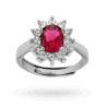 ANELLO HALO SOLITARIO A GRIFFE CON ZIRCONE OVALE ROSSO RUBINO CONTORNATO CON ZIRCONI BIANCHI IN ARGENTO 925 RODIATO