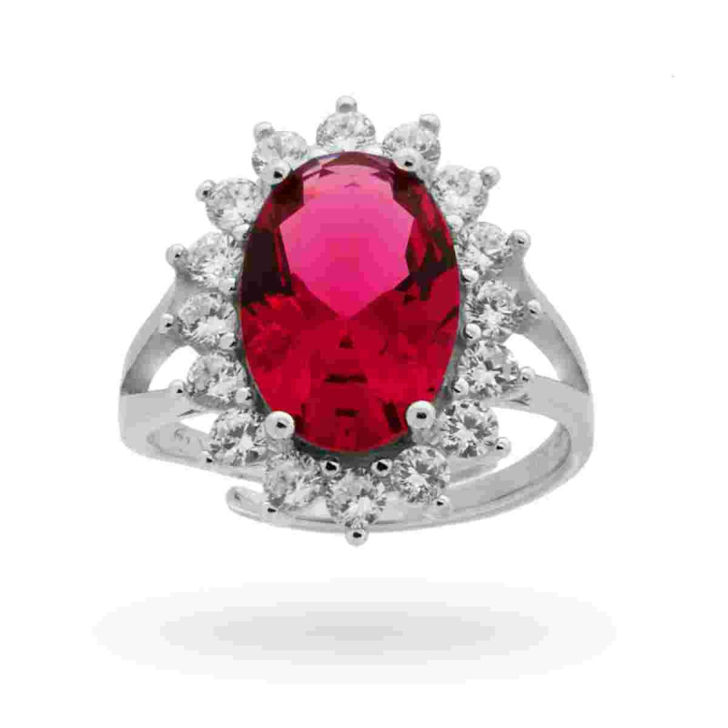 ANELLO SOLITARIO A GRIFFE CON ZIRCONE OVALE ROSSO RUBINO CONTORNATO CON ZIRCONI BIANCHI IN ARGENTO 925 RODIATO