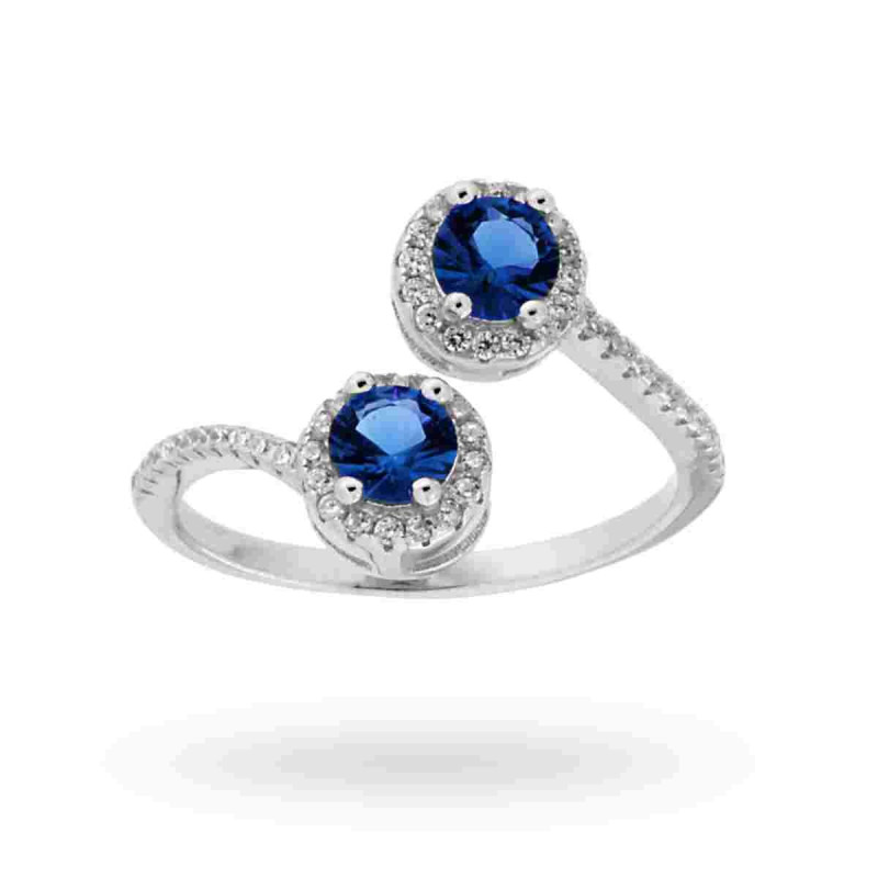 ANELLO CONTRARIE CON ZIRCONI BLU ZAFFIRO E BIANCHI IN ARGENTO 925 RODIATO