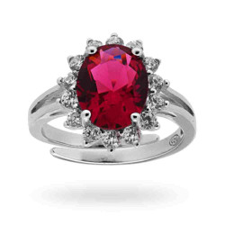 ANELLO SOLITARIO A GRIFFE CON ZIRCONE OVALE ROSSO RUBINO CONTORNATO CON ZIRCONI BIANCHI IN ARGENTO 925 RODIATO