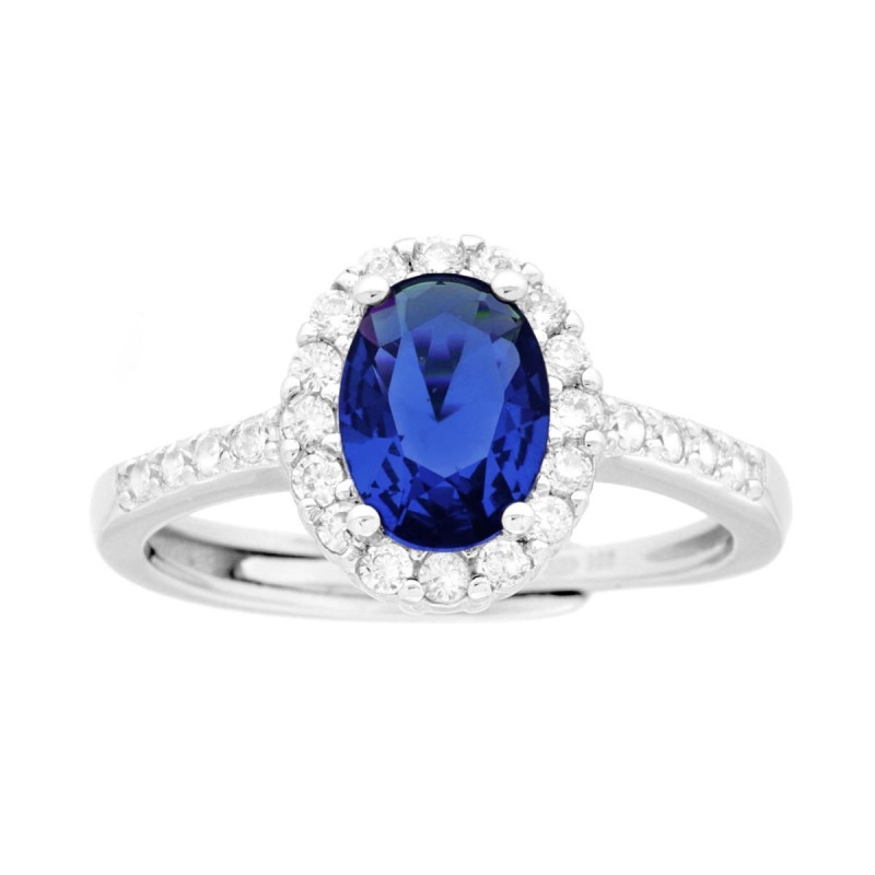 ANELLO HALO SOLITARIO CON ZIRCONE OVALE BLU ZAFFIRO CONTORNATO CON ZIRCONI BIANCHI IN ARGENTO 925 GALVANICA RODIO