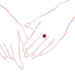 ANELLO HALO CON PIETRA NATURALE OVALE ROSSO RUBINO CONTORNATO CON ZIRCONI BIANCHI IN ARGENTO 925 GALVANICA RODIO