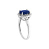 ANELLO CON PIETRA NATURALE OVALE BLU ZAFFIRO CONTORNATO CON ZIRCONI BIANCHI IN ARGENTO 925 GALVANICA RODIO