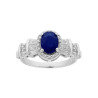 ANELLO CON PIETRA NATURALE OVALE BLU ZAFFIRO CONTORNATO CON ZIRCONI BIANCHI BAGUETTE IN ARGENTO 925 GALVANICA RODIO