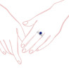 ANELLO CON PIETRA NATURALE OVALE BLU ZAFFIRO CONTORNATO CON ZIRCONI BIANCHI BAGUETTE IN ARGENTO 925 GALVANICA RODIO