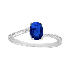 ANELLO SOLITARIO CON OVALE BLU ZAFFIRO CON CUBIC ZIRCONIA BIANCHI IN ARGENTO 925 GALVANICA RODIO