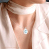 CIONDOLO OVALE ACQUAMARINA CONTORNATO DA GOCCE CUBIC ZIRCONIA BIANCHI IN ARGENTO 925 GALVANICA RODIO