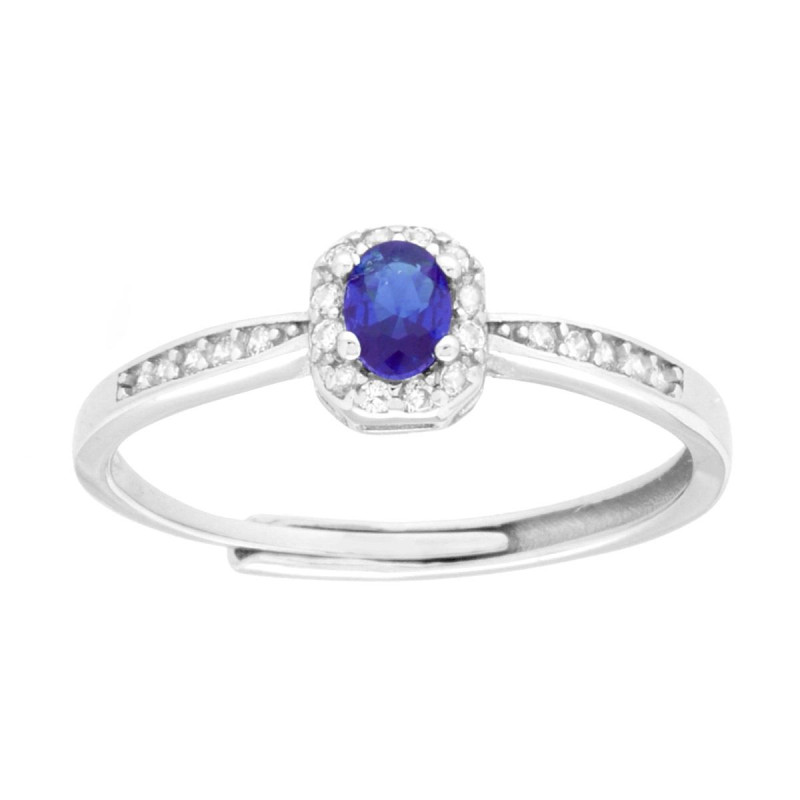 ANELLO SOLITARIO OVALE BLU ZAFFIRO CONTORNATO DA CUBIC ZIRCONIA BIANCHI IN ARGENTO 925 GALVANICA RODIO