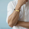 BRACCIALE UOMO IN CAUCCIU PVC NERO CON TARGA COLORE ORO E ROSA DEI VENTI IN ACCIAIO